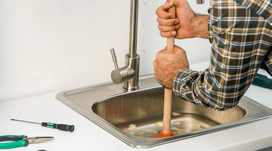 How to Fix a Blocked Kitchen Sink